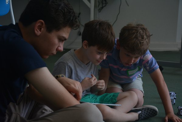 Campers are introduced to the basics of robotics on their first day of camp.   COSETTE NUNEZ-VALAREZO