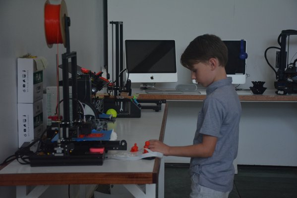 One of the activities at Innovators Camp is learning how to use a 3D printer.    COSETTE NUNEZ-VALAREZO