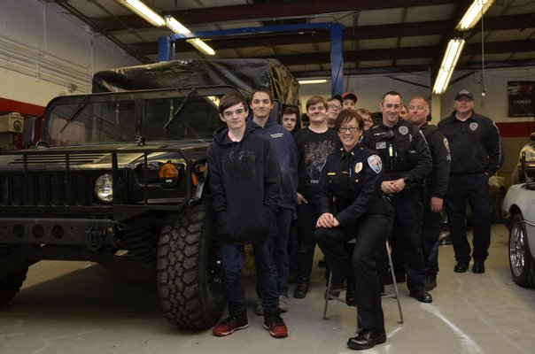 Students in the Auto Body Repair and Car Customizing BOCES program painted a Humvee for the Southampton Town Police. GREG WEHNER