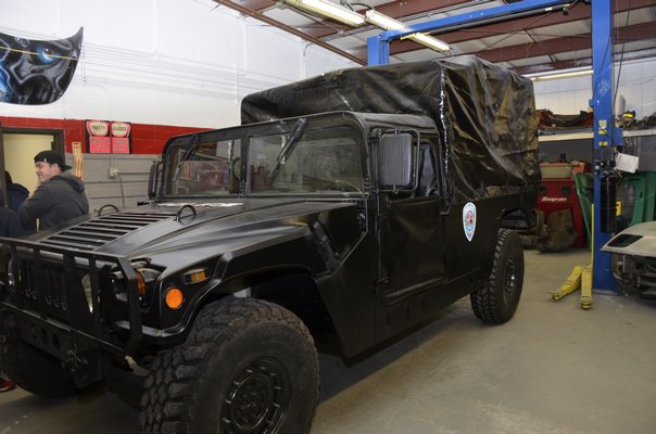 Students in the Auto Body Repair and Car Customizing BOCES program painted a Humvee for the Southampton Town Police. GREG WEHNER