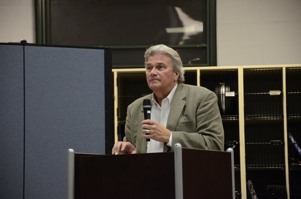 Roger Smith of Patchogue-based BBS Architects & Engineers, presented preliminary options for a new administration building for the Southampton School District on Tuesday night. GREG WEHNER