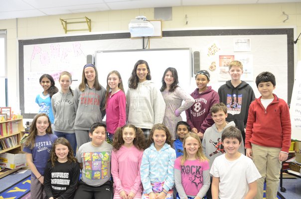 The Southampton Intermediate School Builders Club plans to pitch the idea of using solar powered trash compactors in the village to Mayor Mark Epley. GREG WEHNER