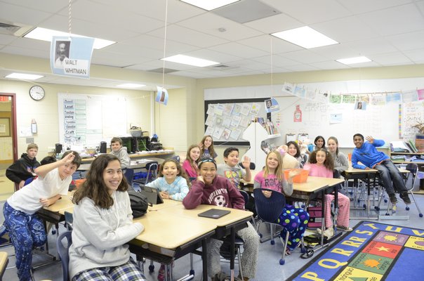 The Southampton Intermediate School Builders Club will pitch eco-friendly trash compactors to Southampton Village Mayor Mark Epley on Thursday. GREG WEHNER