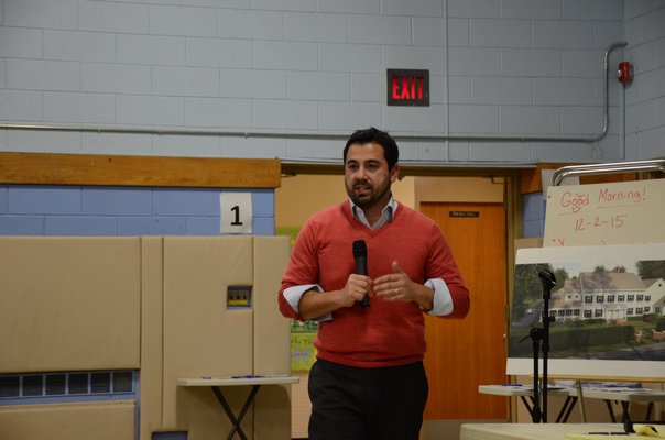 Dave Gallo, President of Georgica Green Ventures, LLC, speaks to a room of over 130 Remsenburg and Speonk residents about a proposal to build workforce housing in Speonk. GREG WEHNER