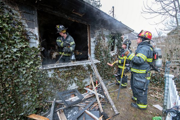 Firefighters responded to the scene of a house fire on Chester Avenue in Bridgehampton on Thursday morning. COURTESY MICHAEL HELLER/SAG HARBOR EXPRESS