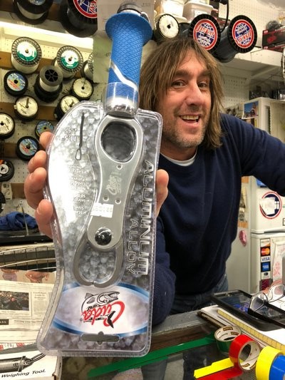 Ken Morse, owner of Tight Lines Tackle in Sag Harbor, recommends the Cuda fish gripper and scale as a great gift for your fisherman or fisherwoman.