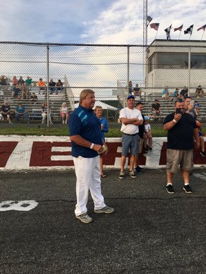 Danny McNamara is honored prior to races at Riverhead Raceway on July 8.