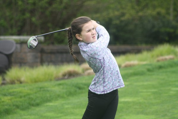 Elie Poremba, 9, of Southampton has been playing golf since she was four years old, and takes lessons with Jason Russell at Southampton Golf Club. She qualified to compete in US Kids Golf Worlds in August. CAILIN RILEY
