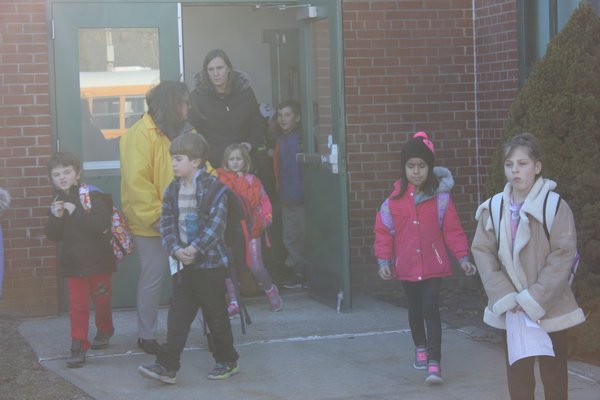 Dozens of East Quogue children who walk home are dismissed. VALERIE GORDON