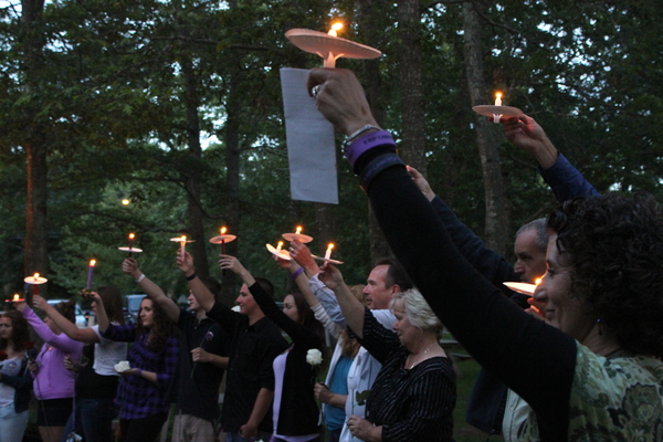 Friends of Cameron Nicholls gathered in the East Quogue village green Tuesday night to honor the memory of the 18 who died tragically last year in a car accident. CAROL MORAN