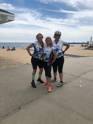 Mitti Ellams, left, Kim Covell and Romi Sloan at the 75-mile mark of their 100-mile ride.