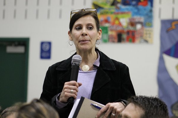 Penni Russo, chair of the East Quogue Teacher Association's budget committee, speaks during a board of education budget hearing Tuesday night. KYLE CAMPBELL