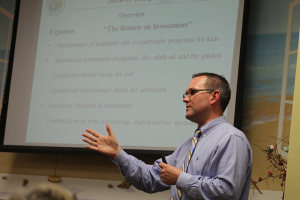 Hampton Bays Schools Superintendent Lars Clemensen gives a presentation on the district's upcoming budget plan during the Hampton Bays Civic Association meeting Monday night. KYLE CAMPBELL