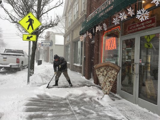 Hampton Bays in the snow on Saturday. DANA SHAW