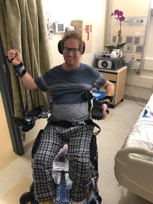Matt Raynor uses his wrist to manuver an electronic wheelchair. COURTESY JONATHAN RAYNOR