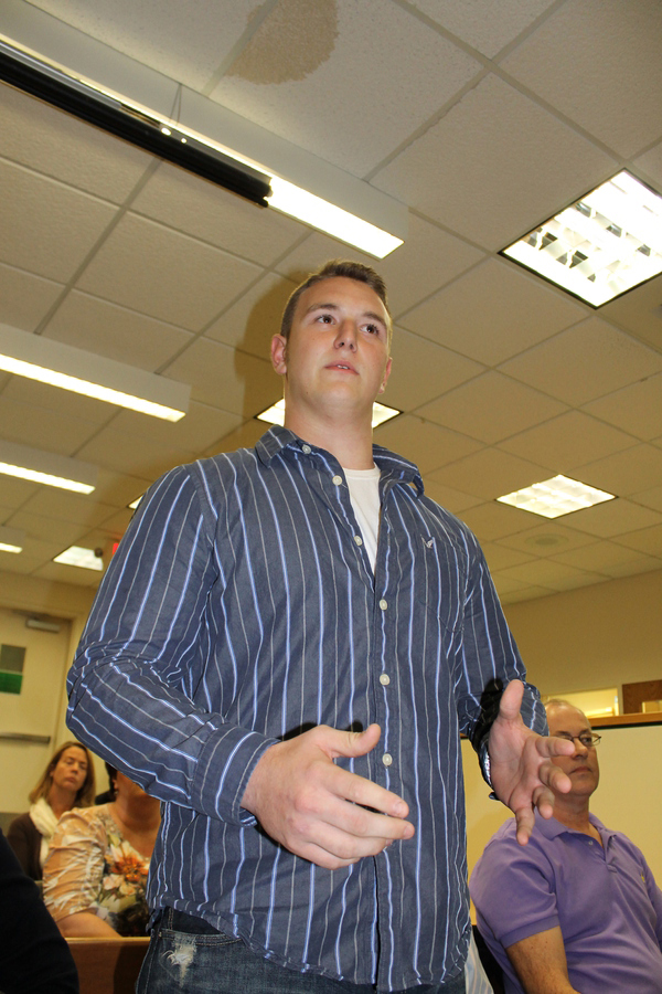 Westhampton Beach senior Zachary Laube addresses the Board of Education Monday evening.