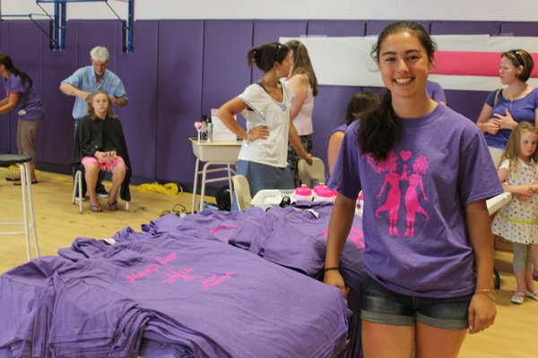 Hampton Bays eighth grader Mackenzie Tyler organized the Hampton Bays "Hair Happening" to benefit Locks of Love on Monday at Hampton Bays Middle School. KYLE CAMPBELL