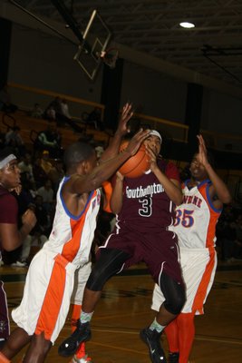 Southampton junior point guard Israel "Izzy" Johnson led his team with 28 points, six assists and four steals in a win over Malverne in the Long Island Class B Championship on Tuesday. CAILIN RILEY