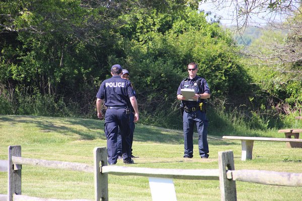 Police officers and detectives were on the scene at Kirk Park on Thursday after a 38-year-old man was found unconscious in Montauk. He has been confirmed dead by Suffolk County Police Homicide Squad detectives. Detectives believe the cause of death to be criminal in nature and are investigating the death as a murder.  KYRIL BROMLEY