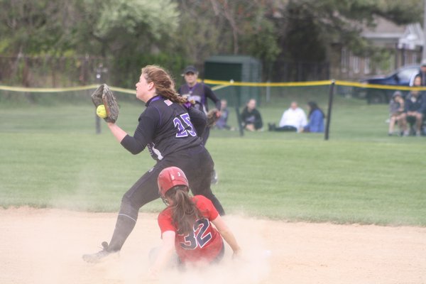 Hampton Bays second baseman Liz Otatti makes an out in her team's 4-3 win over Miller Place in the first round of the Class A playoffs. CAILIN RILEY