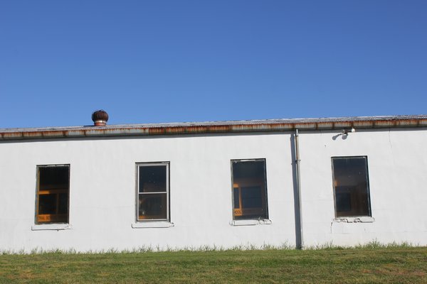 The Riverhead Central School District has a plan in the works to relocate its bus maintenance and facility barn to a property behind the Phillips Avenue Elementary School in Riverside. By CAROL MORAN