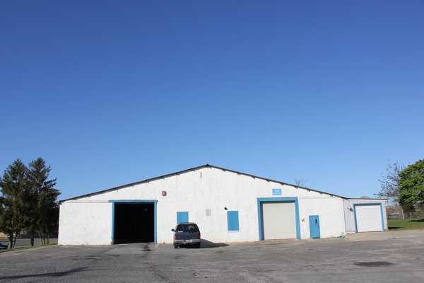 The Riverhead Central School District has a plan in the works to relocate its bus maintenance and facility barn to a property behind the Phillips Avenue Elementary School in Riverside. By CAROL MORAN