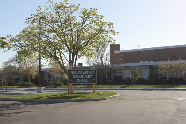 The Riverhead Central School District has a plan in the works to relocate its bus maintenance and facility barn to a property behind the Phillips Avenue Elementary School in Riverside. By CAROL MORAN