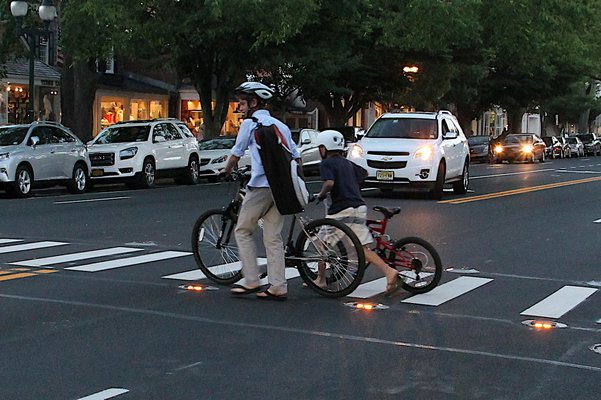 A lighted crosswalk, like the one on Main Street in East Hampton, will be coming to Brdgehampton Main Street this fall.    KYRIL BROMLEY