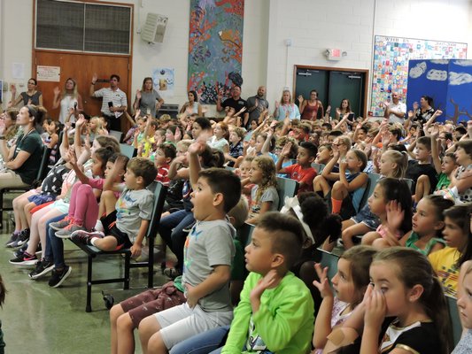 Students at Westhampton Beach Elementary School recite their new leadership pledge. ELSIE BOSKAMP
