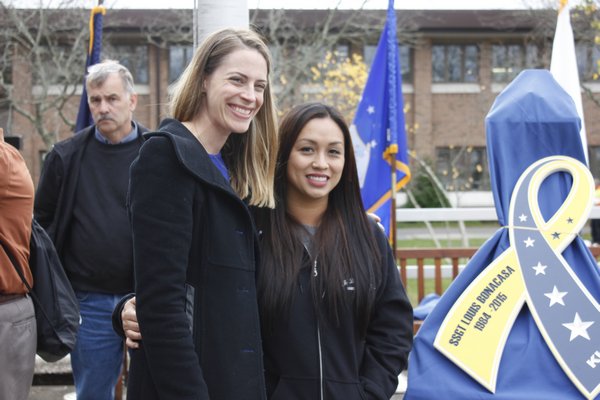 Wife to Louis Bonacasa, Deborah Bonacasa, stands with Meredith Starr, assistant professor of visual arts. VALERIE GORDON