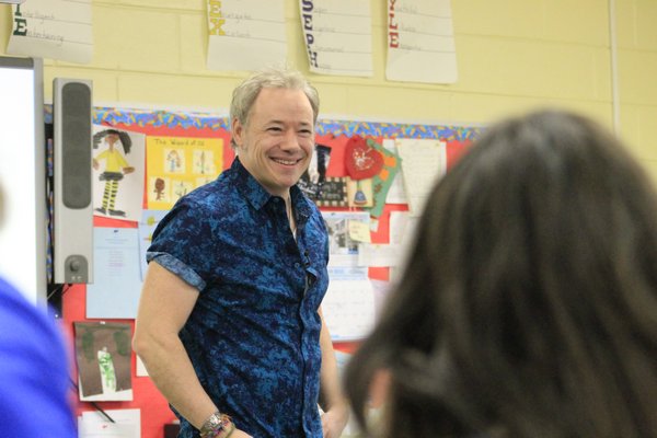 Acclaimed children's musician Brady Rymer took questions from students in the student newspaper class at the Eastern Suffolk BOCES Westhampton Beach Learning Center on Monday morning. KYLE CAMPBELL
