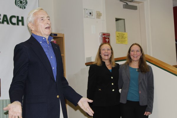 Col. Pete Cuthbert tells storie about his daughters,  Ms. Lee Cuthbert Green (left) and Ms. Lynne Cuthbert Jones, the 2016-2017 Westhampton Beach Wall of Fame inductees. KATE RIGA