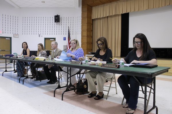 The East Quogue School Board during a special meeting held Tuesday night. KYLE CAMPBELL