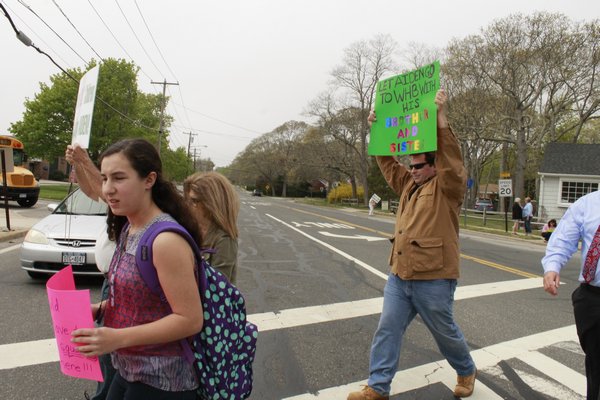 Picketers gathered near the intersection of Mill Road and Oneck Lane in Westhampton Beach on Monday afternoon to advocate for more special education programs in the Westhampton Beach School District.\ KYLE CAMPBELL