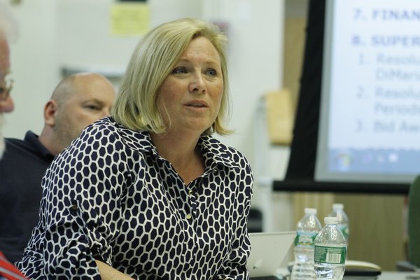 Westhampton Beach School Board member Claire Bean speaks to a crowd of roughly 40 people who attended the board's meeting on Monday night. KYLE CAMPBELl