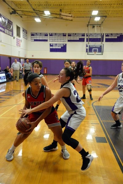 Hampton Bays junior Pam Grajales covers a Center Moriches player. MICHELLE MALONE