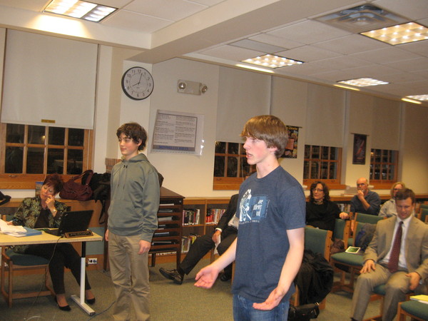 Westhampton Beach High School sophomore Luke Jurow (left) and Riley Owens, a 16-year-old junior, speak to the Board of Education about a concert they organized to help bring back jazz bands.