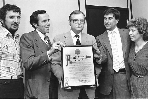 From left to right, Cliff Clark, Jack Faith, Suffolk County Executive Peter Cohalan, John Strode and Janice Olsen. Some time in the early 1980s, Cohalan had a proclamation declaring Shelter Island Run Day.  Clark, Faith and Strode are the race's co-founders.