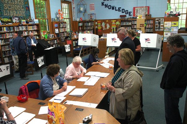 Voters at Springs School cast their ballots on Tuesday, May 19. KYRIL BROMLEY