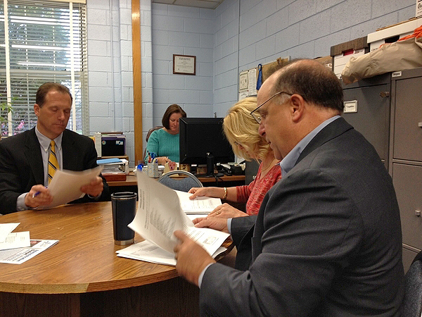 Members of the Remsenburg-Speonk Board of Education at a special meeting to adopt the 2013-2014 budget. ERIN MCKINLEY