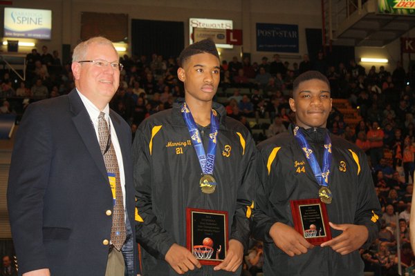 Former Bridgehampton boys basketball player Charles Manning, 20, has signed with Division I powerhouse Louisiana State University. He will transfer to the school after completing his sophomore season at Florida Southwestern State College, one of the top junior colleges in the country. Manning, center, was the MVP when he led the Killer Bees to a state title in 2015. CAILIN RILEY