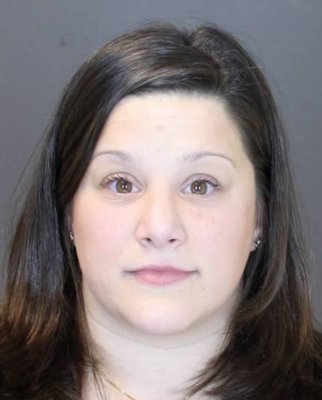 Lauren Comber is accused of stealing more than $35,000 from the Rainbow Preschool in Bridgehampton. Southampton Town Police