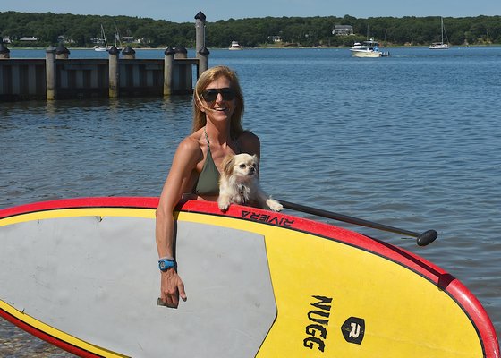 Paddle Diva, which operates out of Shagwong Marina in Springs, is suing over a town ruling that it is violating zoning by using the marina as its base of operations. KYRIL BROMLEY