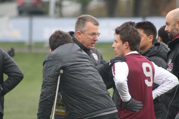 Don McGovern, center, with the East Hampton boys soccer team at the New York State Class A Championship game in Middletown, New York in November. CAILIN RILEY