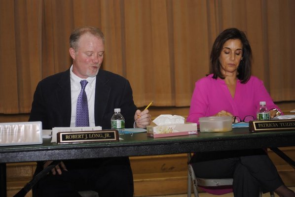 Schools Superintendent Robert Long and Board Of Education President Patricia Tuzzolo during a recent meeting. AMANDA BERNOCCO