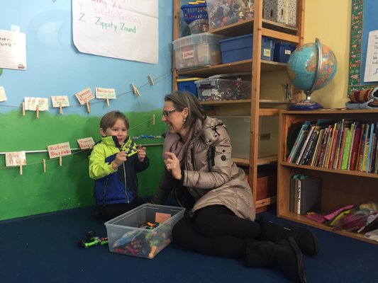 Erik Vuik, 4, with his mother, Karolina Vuik, at the Love of Learning Children's Center in Quogue. CAILIN RILEY
