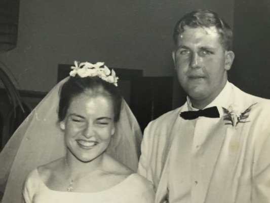 Cliff Foster and his wife, Lee Foster, on their wedding day. They celebrated 54 years of marriage just days before he died.