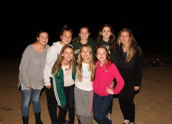 Hailey Hawkesworth, Jessica Muchowski, Katie Sheehan, Amanda Giammona, Kiersten Furmann, Jill Mapley, Kylie Cast and Shannon McLaren at the Westhampton Beach Schools Homecoming bonfire on Thursday, October 9. Neil Salvaggio