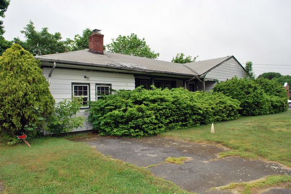 The East Quogue School District intends to demolish the house next door to the elementary school this summer.     WILL JAMES