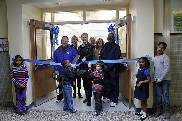 Phillips Avenue Elementary School students and Riverhead School District administrators celebrated the opening of their renovated library with a ribbon cutting on Thursday, March 14. CAROL MORAN